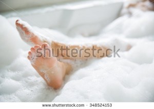 stock-photo-women-s-feet-she-was-bathing-in-a-a-bathtub-with-happiness-348524153
